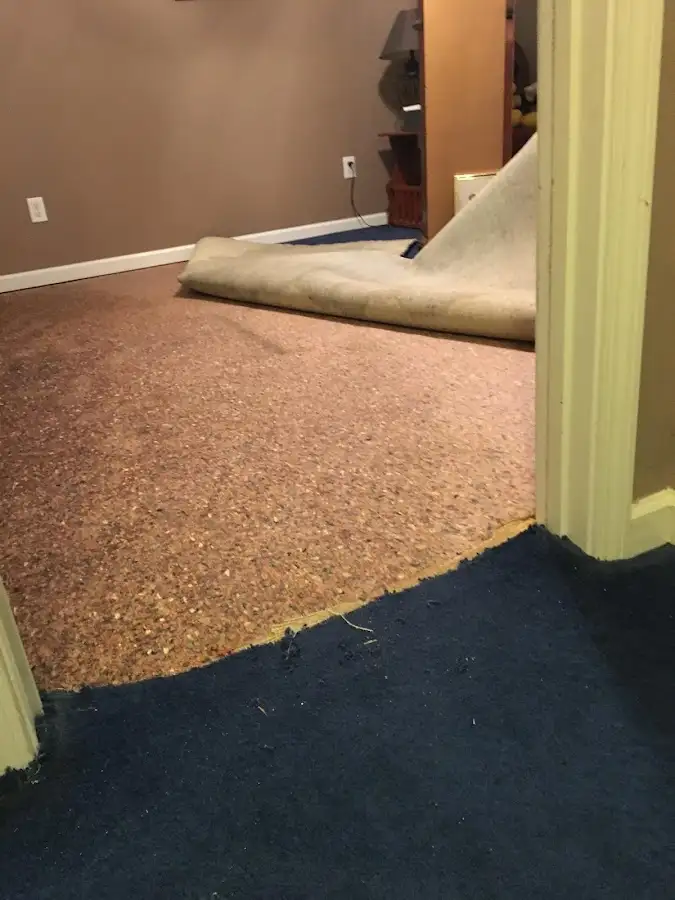 Carpet pad removal revealing water damage during Drying & Dehumidification in Boyes Hot Springs
